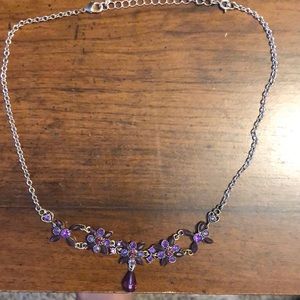 Beautiful amethyst type stones shaped in hearts, flowers and a teardrop